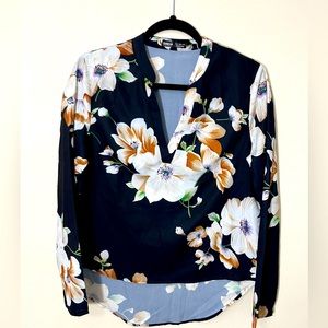 Floral print split neck top, size small.